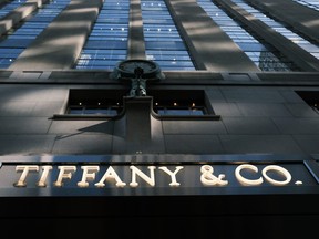 The Tiffany and Co sign is displayed outside of their flagship store along Fifth Avenue